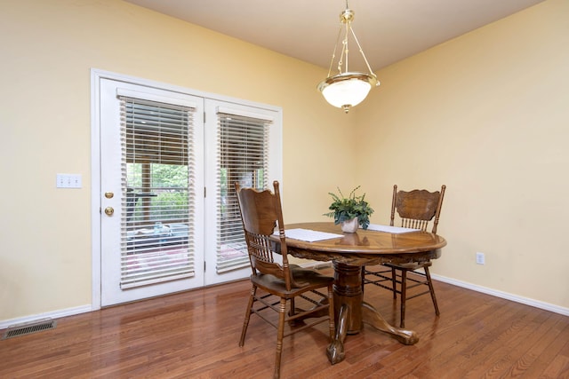 904 W Crater Cir, Nixa, MO 65714 - dining space with wood finished floors and baseboards