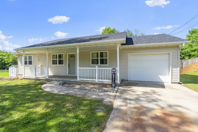 ranch-style home with covered porch, a garage, driveway, a storage shed, and roof with shingles