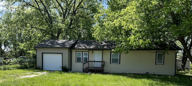 view of front of house featuring an attached garage and stucco siding