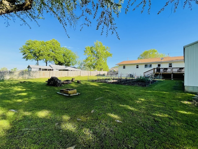 view of yard featuring a deck