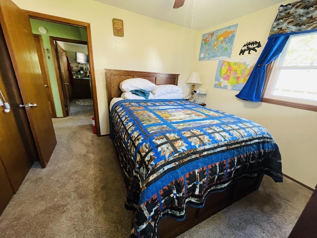 carpeted bedroom featuring ceiling fan