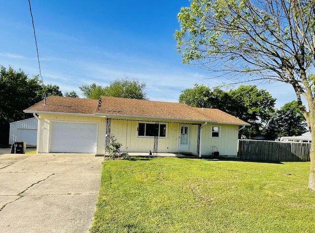 ranch-style house featuring driveway, an attached garage, and a shingled roof