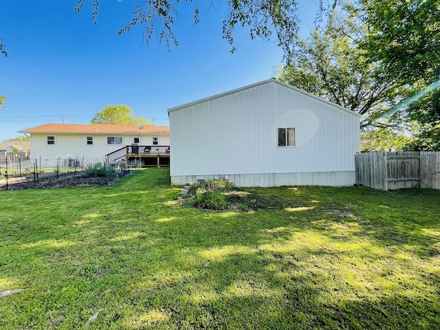 view of yard with a deck and stairway