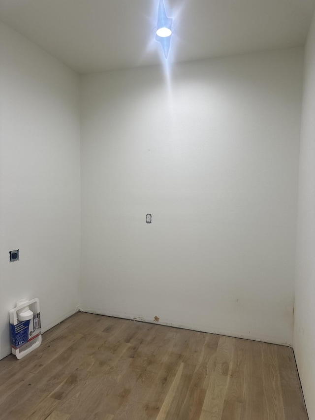 empty room featuring wood finished floors