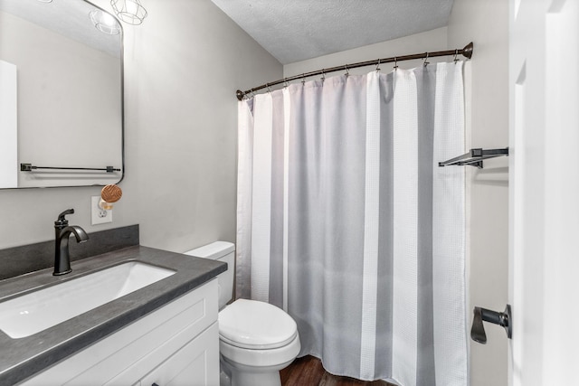 5376 S 140th Rd, Morrisville, MO 65710 - full bathroom featuring toilet, a textured ceiling, vanity, and a shower with curtain