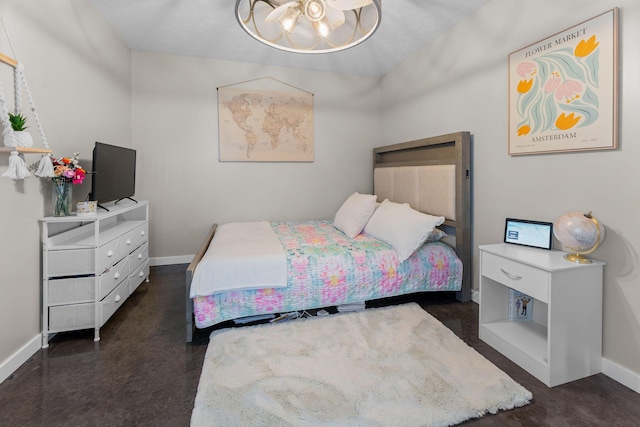 5376 S 140th Rd, Morrisville, MO 65710 - bedroom with baseboards and a chandelier