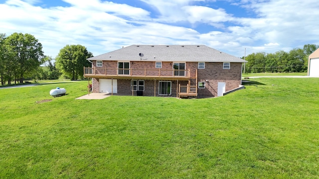 5376 S 140th Rd, Morrisville, MO 65710 - rear view of property featuring a wooden deck, an attached garage, brick siding, and a lawn