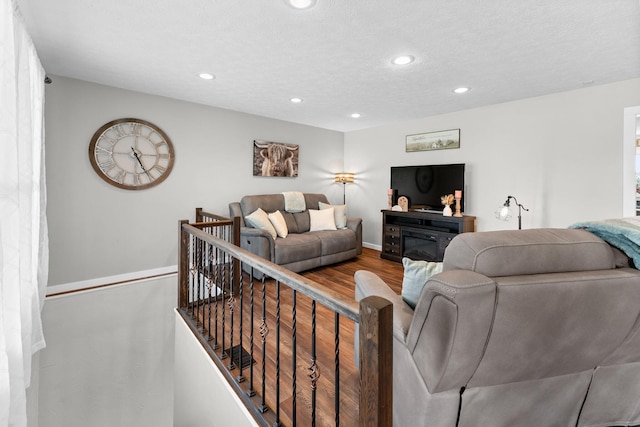 5376 S 140th Rd, Morrisville, MO 65710 - living area with wood finished floors, recessed lighting, and baseboards