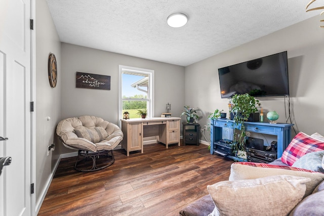 5376 S 140th Rd, Morrisville, MO 65710 - living room with dark wood finished floors, a textured ceiling, and baseboards