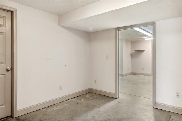 580 Cedar Hill Ln, Marshfield, MO 65706 - empty room featuring concrete flooring and baseboards