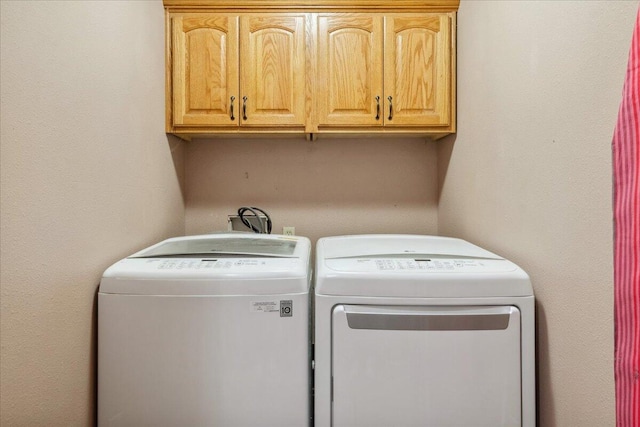 580 Cedar Hill Ln, Marshfield, MO 65706 - clothes washing area with cabinet space and washer and clothes dryer