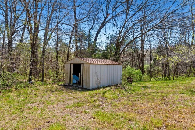 580 Cedar Hill Ln, Marshfield, MO 65706 - view of shed featuring a forest view