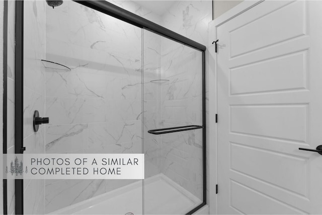 361 Stillwood Dr, Branson, MO 65616 - full bathroom featuring a marble finish shower