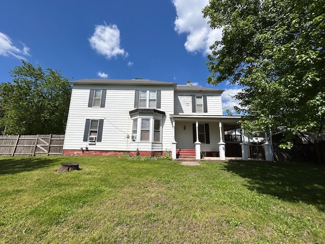back of property with a porch and cooling unit