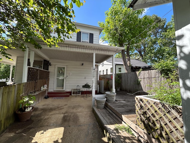 view of patio featuring fence and entry steps