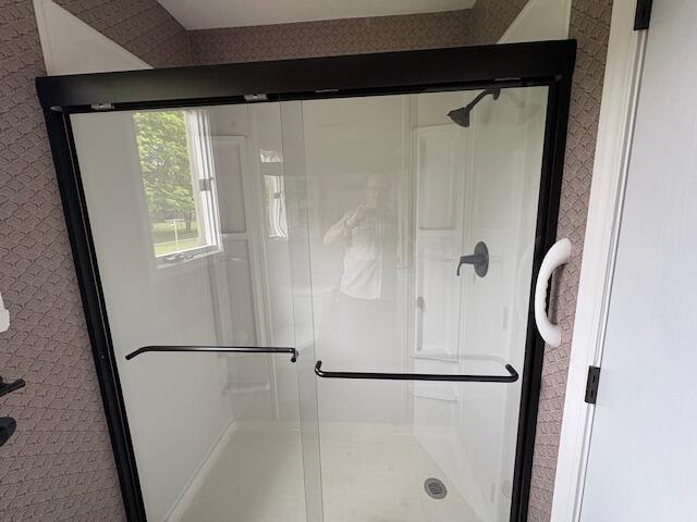 bathroom with a stall shower