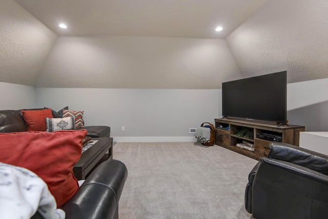 living area featuring lofted ceiling, carpet floors, and baseboards