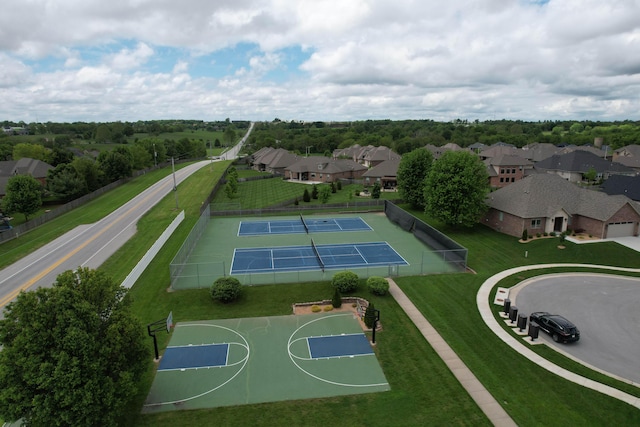 view of basketball court with a tennis court, community basketball court, and a residential view