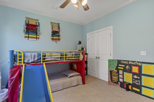 5998 S Parkhaven Ln, Springfield, MO 65810 - bedroom with crown molding, carpet, a closet, and ceiling fan