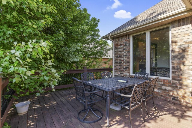 5998 S Parkhaven Ln, Springfield, MO 65810 - wooden terrace with outdoor dining space
