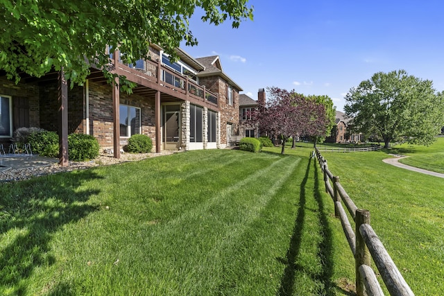 5998 S Parkhaven Ln, Springfield, MO 65810 - view of grassy yard with a deck