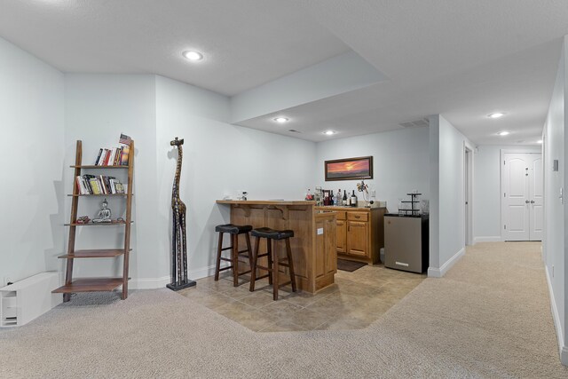 5998 S Parkhaven Ln, Springfield, MO 65810 - indoor wet bar featuring light carpet, baseboards, and recessed lighting