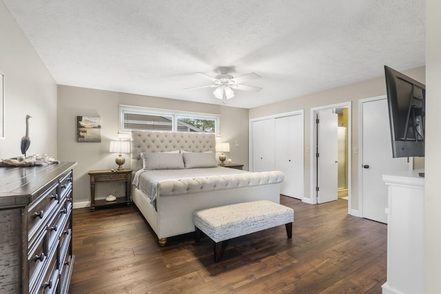 1294 Acacia Club Rd, Hollister, MO 65672 - bedroom featuring dark wood-type flooring, a closet, baseboards, a textured ceiling, and a ceiling fan