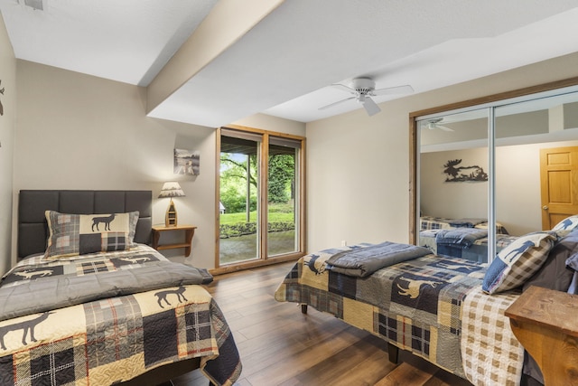 1294 Acacia Club Rd, Hollister, MO 65672 - bedroom featuring wood finished floors and ceiling fan