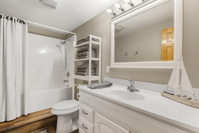 1294 Acacia Club Rd, Hollister, MO 65672 - full bathroom with vanity, shower / bath combo with shower curtain, and toilet