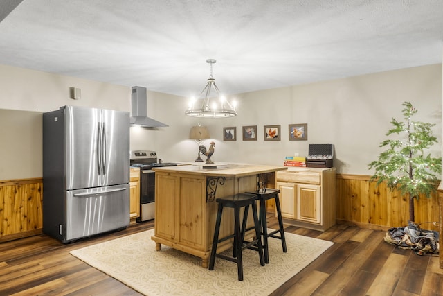 1294 Acacia Club Rd, Hollister, MO 65672 - kitchen with appliances with stainless steel finishes, wall chimney range hood, a center island, dark wood-type flooring, and wainscoting