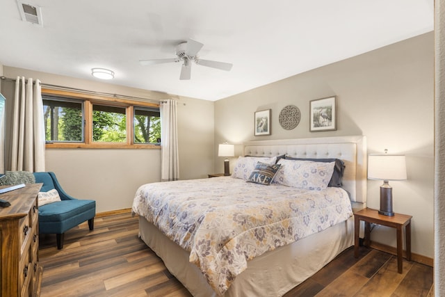 1294 Acacia Club Rd, Hollister, MO 65672 - bedroom with wood finished floors, baseboards, and a ceiling fan