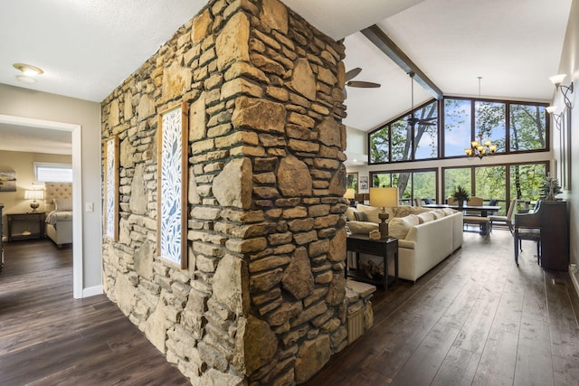 1294 Acacia Club Rd, Hollister, MO 65672 - living area with a chandelier, dark wood-type flooring, beam ceiling, healthy amount of natural light, and high vaulted ceiling
