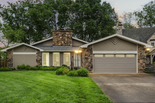 1294 Acacia Club Rd, Hollister, MO 65672 - mid-century inspired home featuring stone siding, a chimney, driveway, a front lawn, and an attached garage