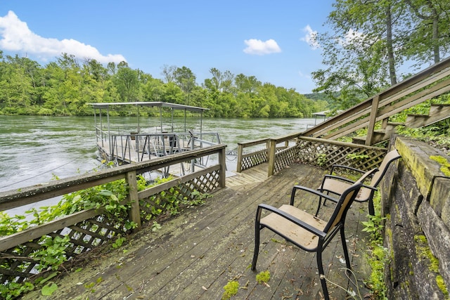 1294 Acacia Club Rd, Hollister, MO 65672 - wooden terrace featuring a water view and a wooded view
