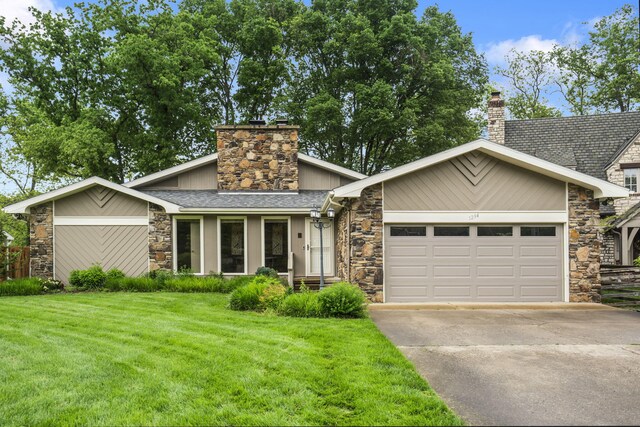 1294 Acacia Club Rd, Hollister, MO 65672 - mid-century inspired home with stone siding, a chimney, concrete driveway, a front yard, and an attached garage