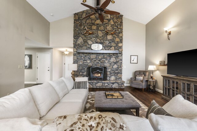 1294 Acacia Club Rd, Hollister, MO 65672 - living room featuring high vaulted ceiling, ceiling fan, baseboards, wood finished floors, and a fireplace