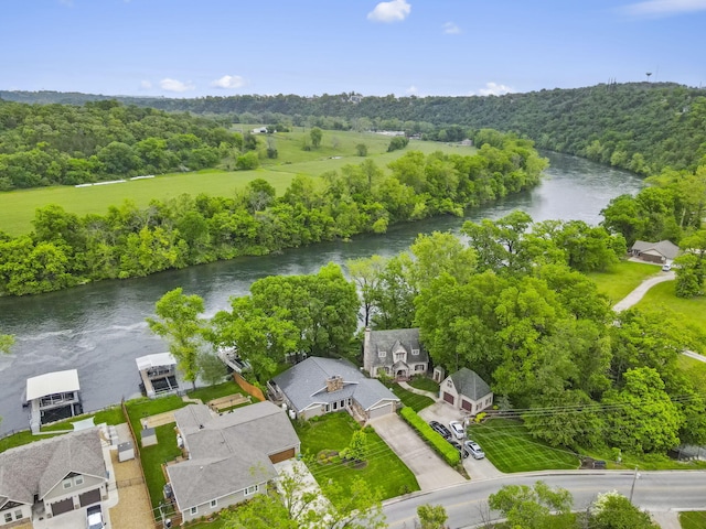 1294 Acacia Club Rd, Hollister, MO 65672 - drone / aerial view of a nearby body of water and a heavily wooded area