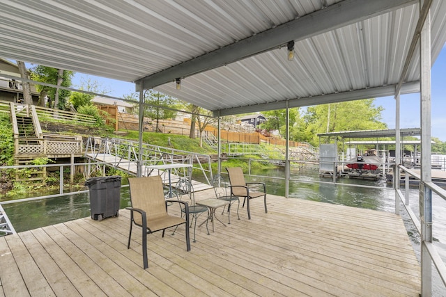 1294 Acacia Club Rd, Hollister, MO 65672 - dock with a water view, fence, and boat lift
