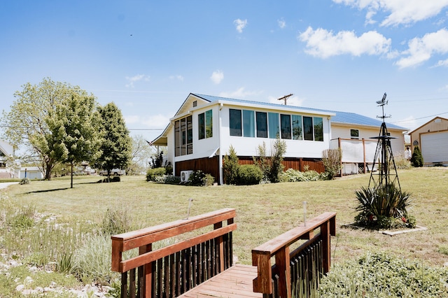 21246 County Road 295, Hermitage, MO 65668 - view of front of property with a front yard and metal roof