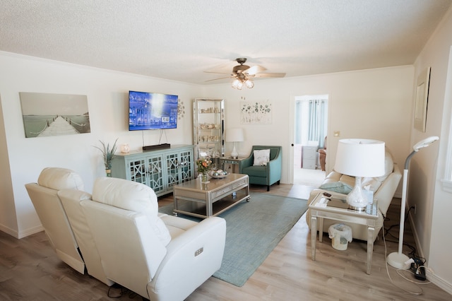 21246 County Road 295, Hermitage, MO 65668 - living room with ceiling fan, wood finished floors, and baseboards