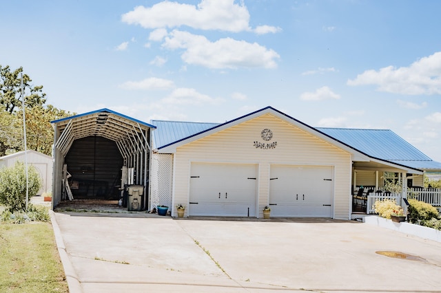 21246 County Road 295, Hermitage, MO 65668 - view of front facade with metal roof and an outdoor structure
