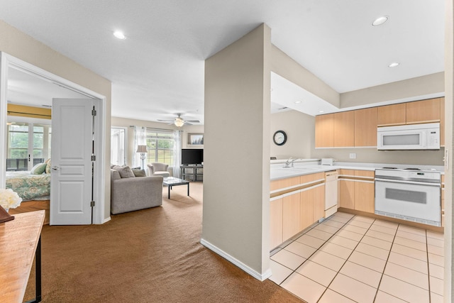 351 S Wildwood Dr Unit 3-2, Branson, MO 65616 - kitchen featuring white appliances, light countertops, light carpet, light brown cabinetry, and a ceiling fan