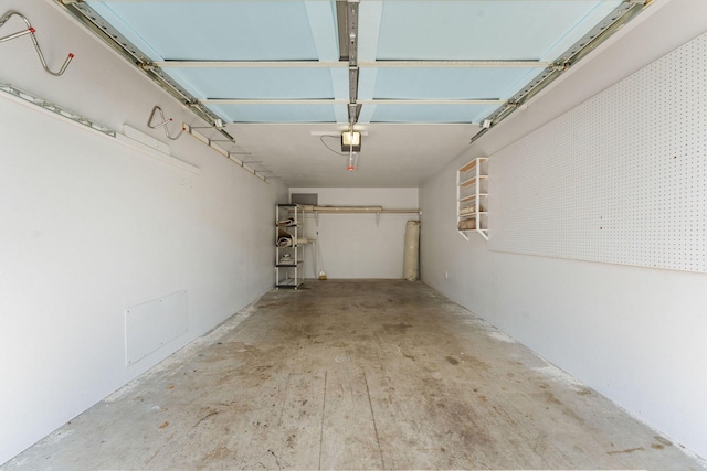 351 S Wildwood Dr Unit 3-2, Branson, MO 65616 - garage featuring a garage door opener