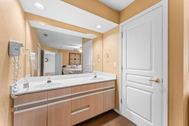 351 S Wildwood Dr Unit 3-2, Branson, MO 65616 - bathroom featuring ensuite bath, a ceiling fan, and double vanity