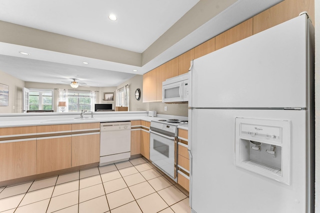 351 S Wildwood Dr Unit 3-2, Branson, MO 65616 - kitchen with white appliances, a sink, light countertops, recessed lighting, and light tile patterned floors