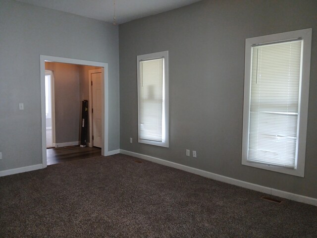 639 W Webster St, Springfield, MO 65802 - empty room featuring carpet flooring and baseboards