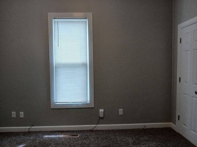 639 W Webster St, Springfield, MO 65802 - spare room with carpet flooring and baseboards