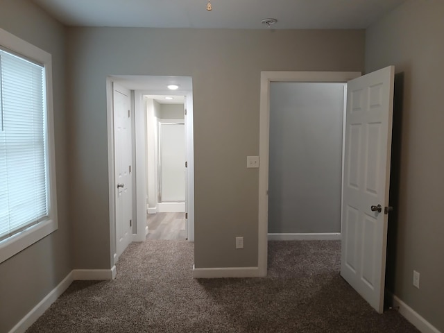 639 W Webster St, Springfield, MO 65802 - unfurnished bedroom with carpet floors and baseboards