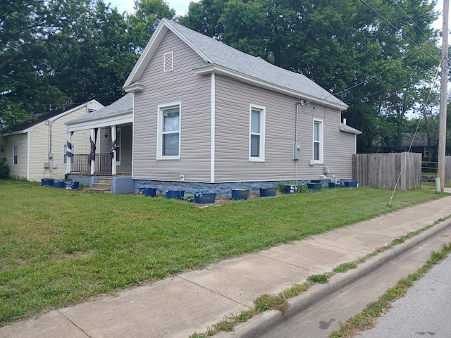 639 W Webster St, Springfield, MO 65802 - view of home's exterior with a porch and a shingled roof