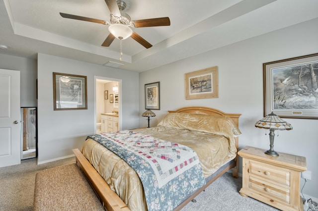 358 W Granada St, Republic, MO 65738 - bedroom featuring carpet floors, a tray ceiling, baseboards, ensuite bath, and ceiling fan